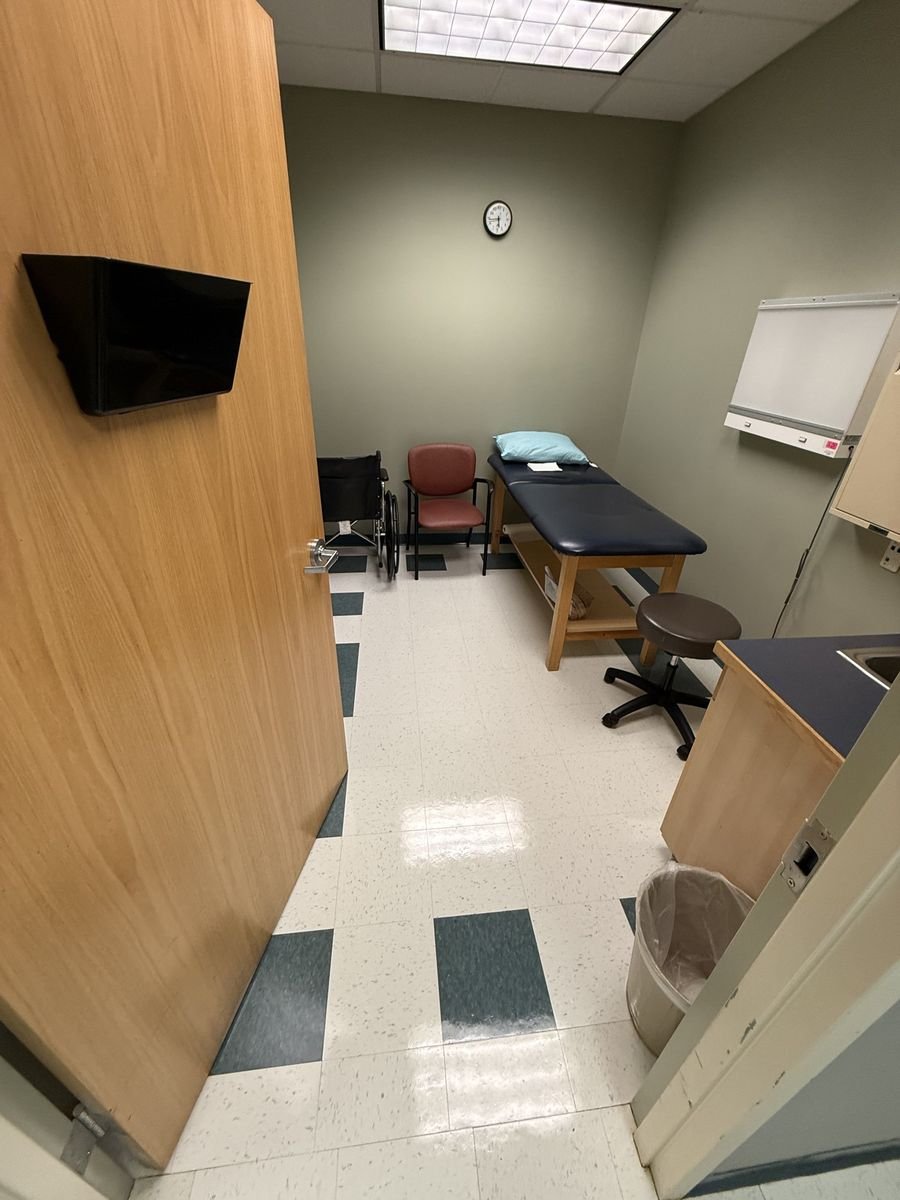 Clinic exam room floor after stripping and waxing